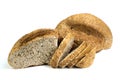 Many mixed breads and rolls of baked bread on isolated white background.