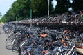 Many modern bicycles parked on city street Royalty Free Stock Photo