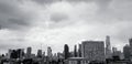 Many modern and high building in Bangkok city, Thailand with sky and cloud background and copy space above in black and white tone Royalty Free Stock Photo