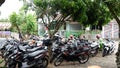 Many motorbikes are parked in a row. Royalty Free Stock Photo