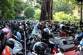 Many motorcycles and helmets lined up Royalty Free Stock Photo