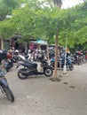 Banyuwangi, Indonesia - 20 November 2021: Many motorcycles at shopping center parking lot.