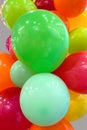 Many multi colored balloons. Party decoration for festive atmosphere. Selective focus. Bright jumble. Abstract background. Close-