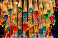 many multi-colored light bulbs in the form of drops hang on the ceiling Royalty Free Stock Photo