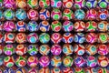 Many multi-colored lottery balls with numbers in a row.