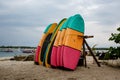 Many multi-colored surfboards in a row for rent Royalty Free Stock Photo