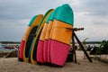 Many multi-colored surfboards in a row for rent Royalty Free Stock Photo