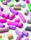 Many multicolored pastel crayons on a white background Royalty Free Stock Photo