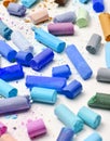Many multicolored pastel crayons on a white background Royalty Free Stock Photo