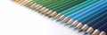 Many multicolored pencils lying in color of rainbow on white background closeup Royalty Free Stock Photo