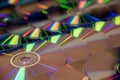 Many musical compact discs with a rainbow spectrum of colors as