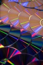 Many musical compact discs with a rainbow spectrum of colors as