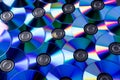 Many musical compact discs with a rainbow spectrum of colors as