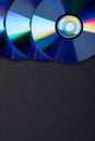 Many musical compact discs with a rainbow spectrum of colors as