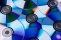 Many musical compact discs with a rainbow spectrum of colors as