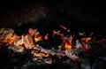 Natural coals burning in a meat spit Royalty Free Stock Photo