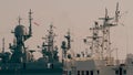 Many naval ships with flags at Russian military base Royalty Free Stock Photo