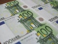 Many new 100 Euro banknotes are neatly arranged in rows Royalty Free Stock Photo