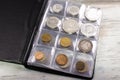 Many old coins in the numismatics album