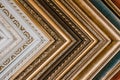 Many old frame pattern background. Framing. Collection of old fashioned different art frames in shop Royalty Free Stock Photo