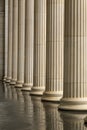 Many old greek columns with reflection Royalty Free Stock Photo