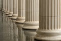Many old greek columns with reflection Royalty Free Stock Photo