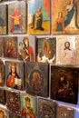 Many old icons. Orthodox icon. Image of the Saints. Virgin Mary and others. Painting, drawing on wood. Vintage and retro