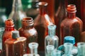 Many Old Medical Glass Capacity. Detail Of Retro Chemical Pharmaceutical Science Researches. Many Small Vintage Bottles
