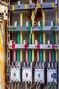 Many old rusty electrical fuse boxes with electic cables Royalty Free Stock Photo