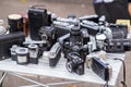 Many Old Vintage Soviet Analog Photo Camera on a Flea Market Outdoors. Royalty Free Stock Photo