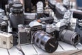 Many Old Vintage Soviet Analog Photo Camera on a Flea Market Outdoors.