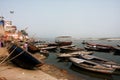 Many old wooden river boats on the bank of Ganges waiting for the tourists and the passengers