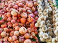 Many Onions and Garlic Heads For Sale at Market