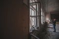 Many open windows in an abandoned rural school near the city of Pripyat, Chernobyl region, exclusion zone, Ukraine