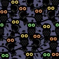 Many owls in the night forest look with shining eyes, seamless pattern