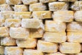 Many packages of cheese are on the counter of the store Royalty Free Stock Photo