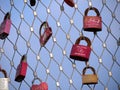 Many padlocks of lovers hanging on bridge railings