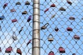 Many padlocks of lovers hanging on bridge railings