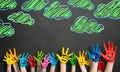 Many painted kids hands with smileys Royalty Free Stock Photo