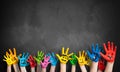 Many painted kids hands with smileys Royalty Free Stock Photo