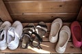 Many pairs of summer shoes needs to be cleaned and organized for storage, out of season shoes Royalty Free Stock Photo