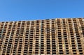 many pallets and blue sky