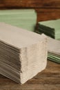 Many paper towles on wooden table, closeup Royalty Free Stock Photo