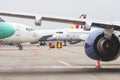 Many parked airplanes at airport