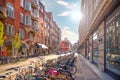 Many bikes on a narrow old Minter Street MÃÂ¸ntergade in the Old Town of Copenhagen, Denmark Royalty Free Stock Photo