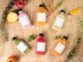 Many pastel color drink in plastic bottle container with empty logo label. mixed many vegetables and fruits smoothie juice on stud