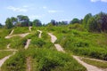 Many paths of different directions on the green hills Royalty Free Stock Photo