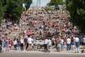 Many people in amphitheater at crowded Park Mauerpark wathchin