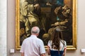 Many people appreciate art works in the Louvre Museum, the world`s largest art museum and a historic monument in Paris, France