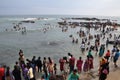 Many people bathing in the sea of Cape Comorin